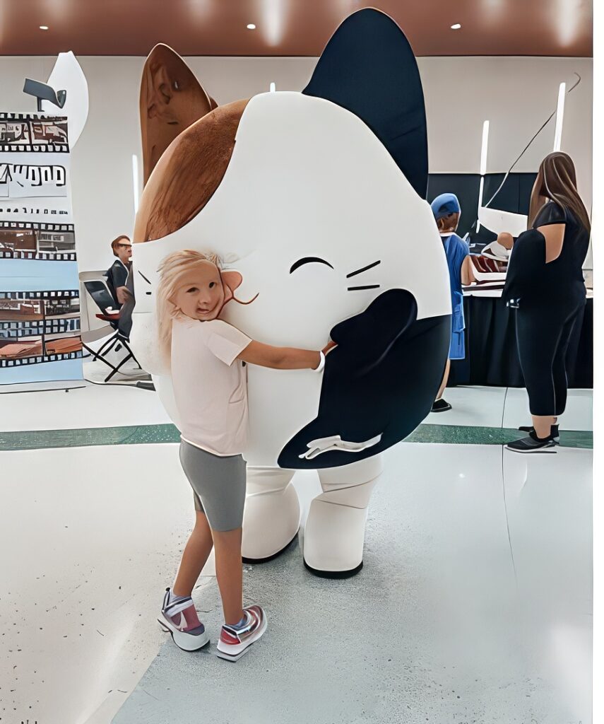Jazwares Squishmallows mascot with fan