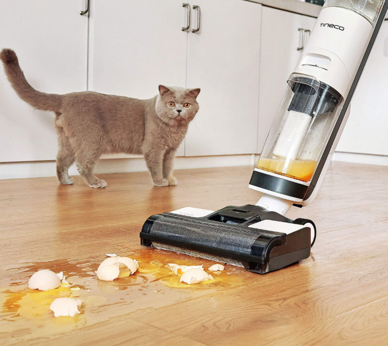Vacuum cleaning up spilled broken eggs