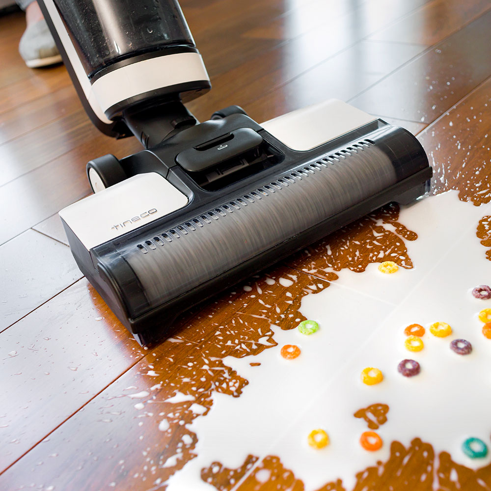 Tineco floor washer cleaning up cereal and milk